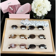 Miu miu Sunglasses